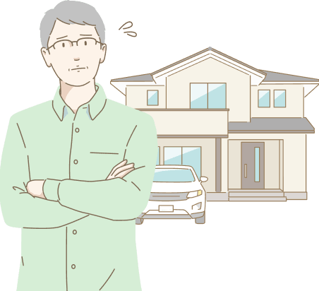 相続した住宅について悩む男性