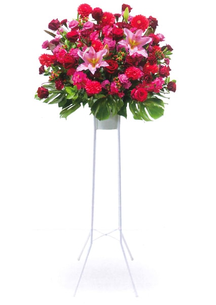 赤やピンクの花を使ったスタンド花